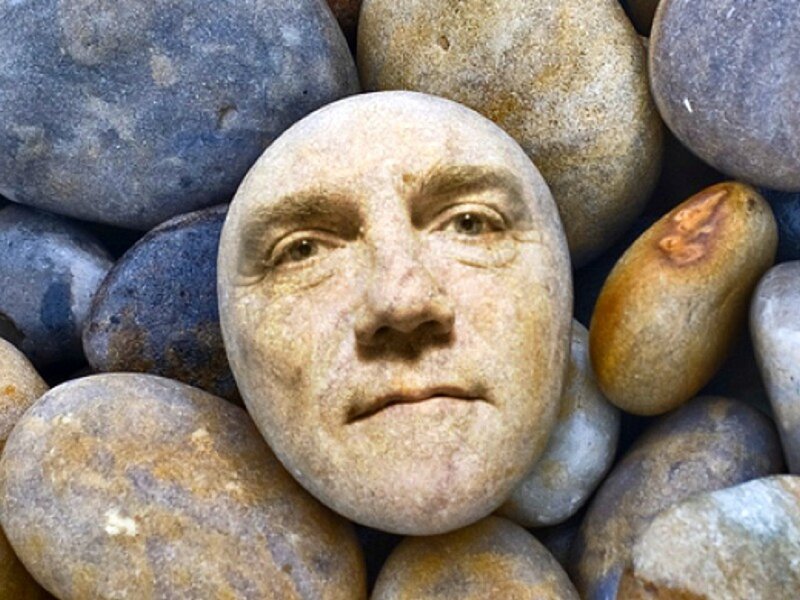 Stone with Face Carving — Gray