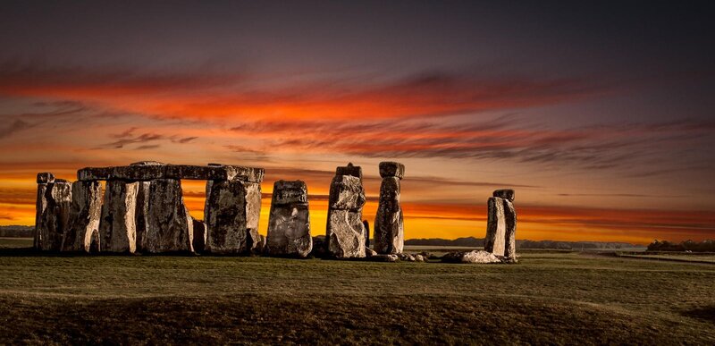 Stonehenge at Sunset — Orange, Dramatic, Photograph, Sky, Grass, Stones