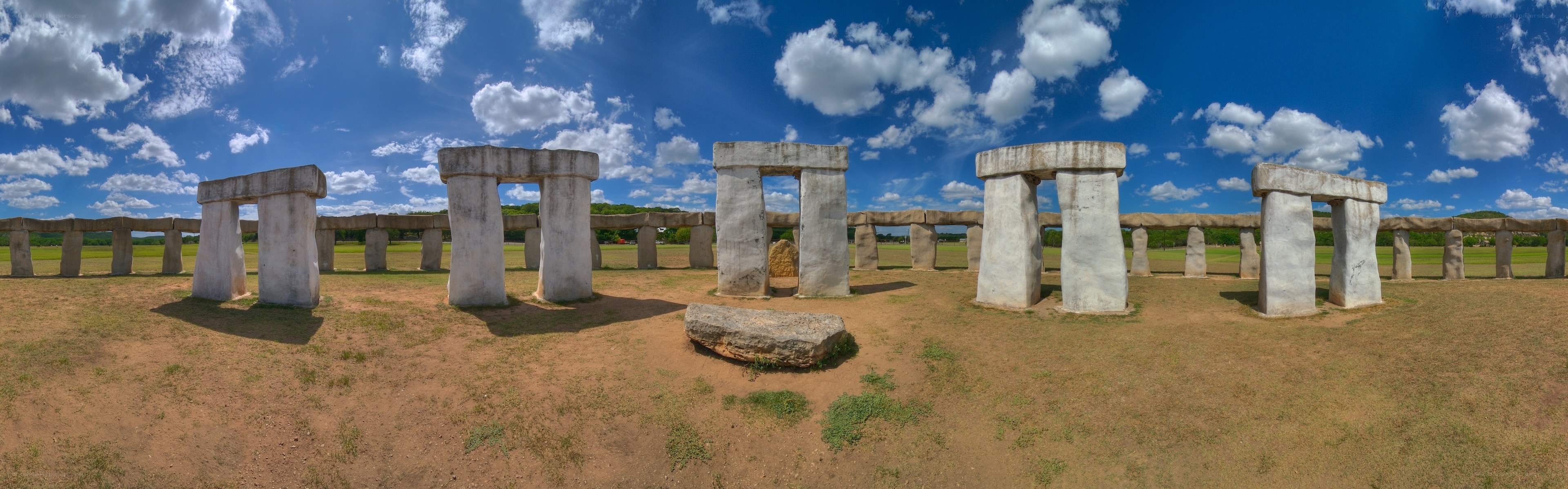 Stonehenge replica under blue sky