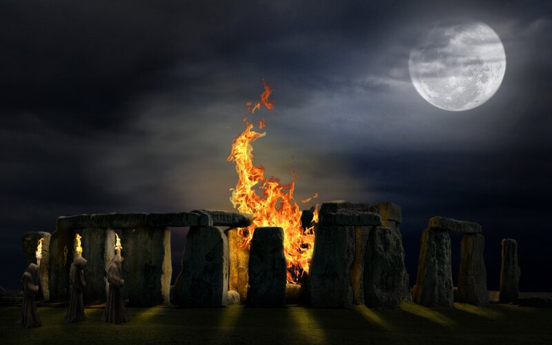 Stonehenge ritual under moonlight