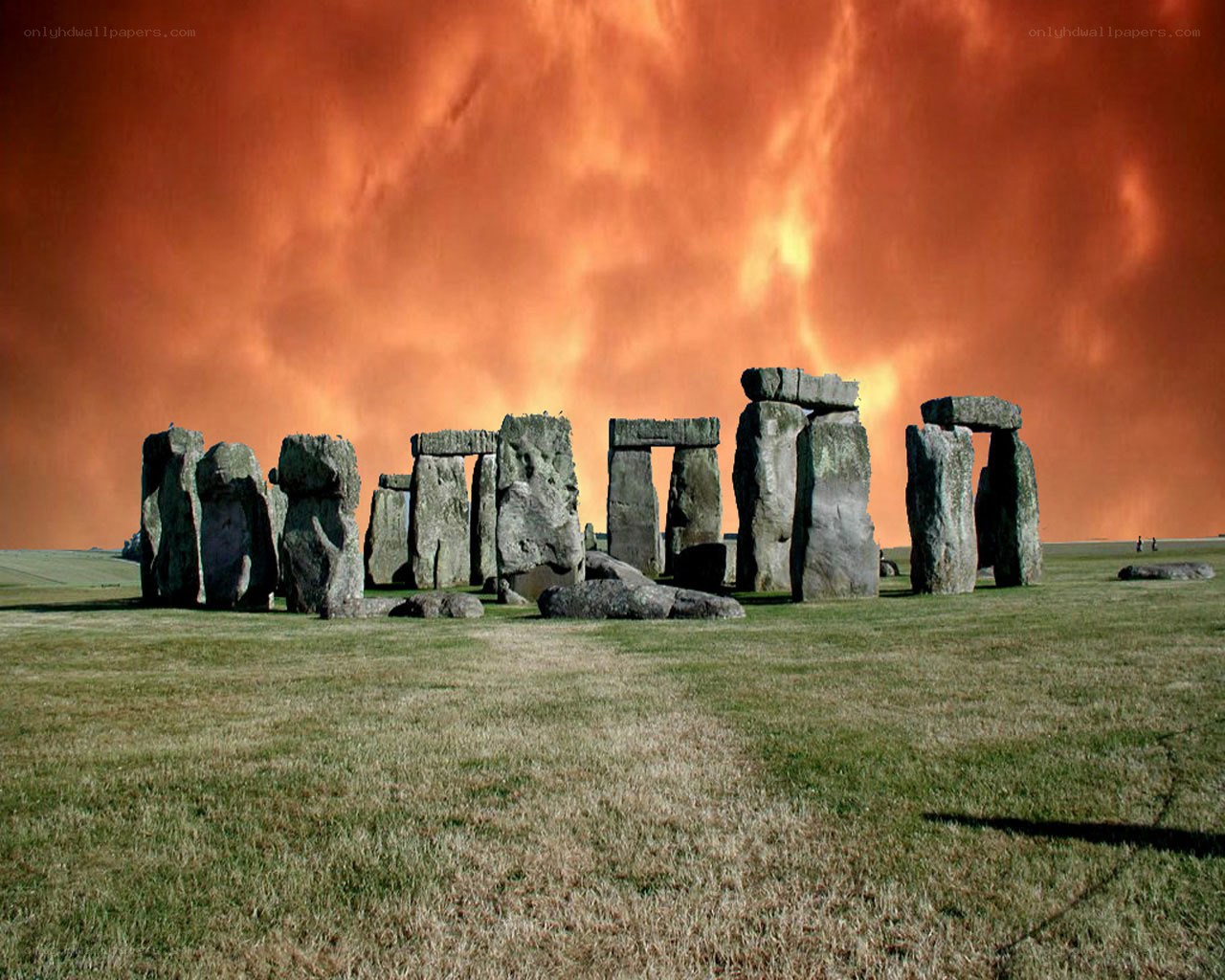 Stonehenge under fiery sky