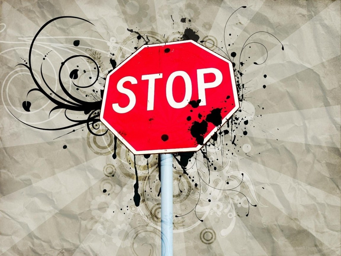 stop sign with graffiti art