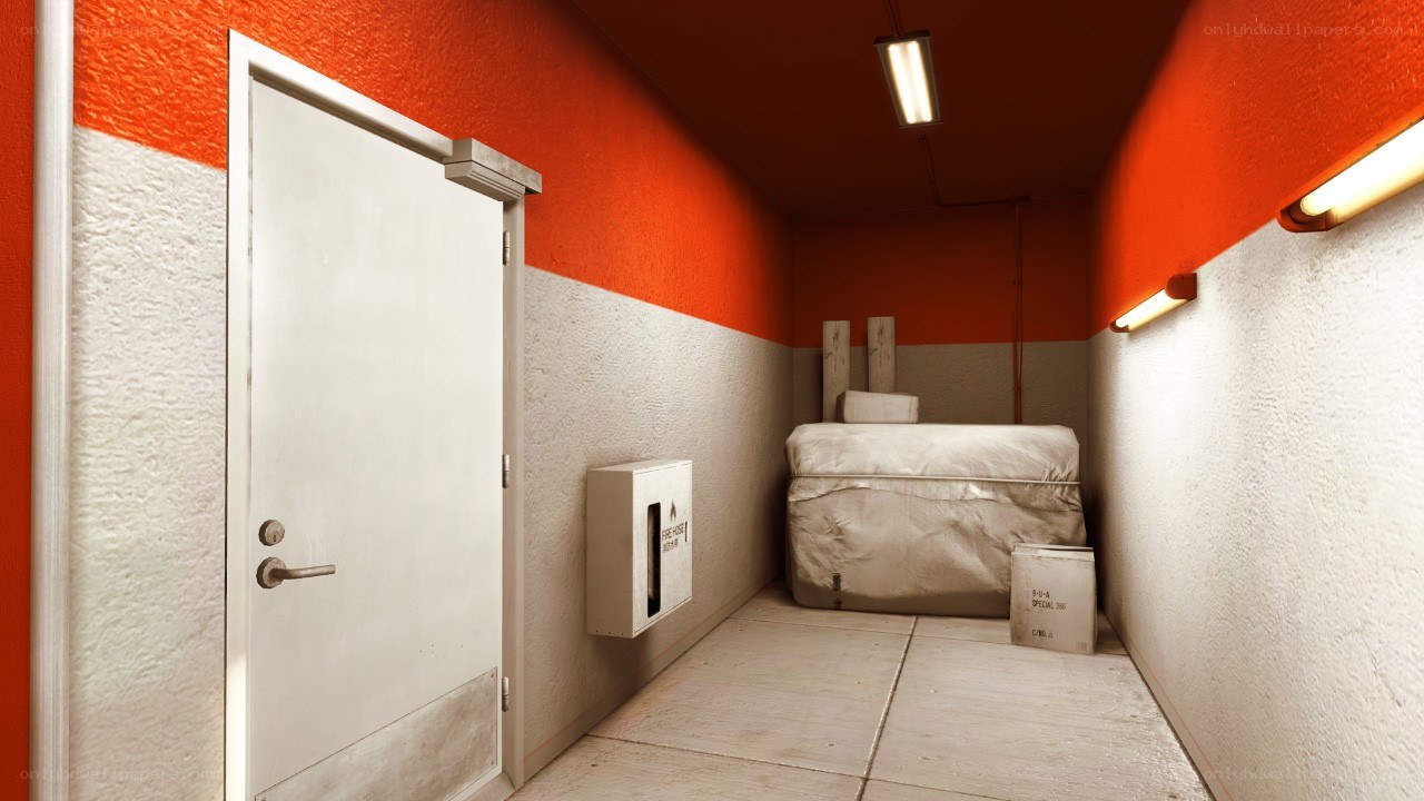 storage room with bed and door