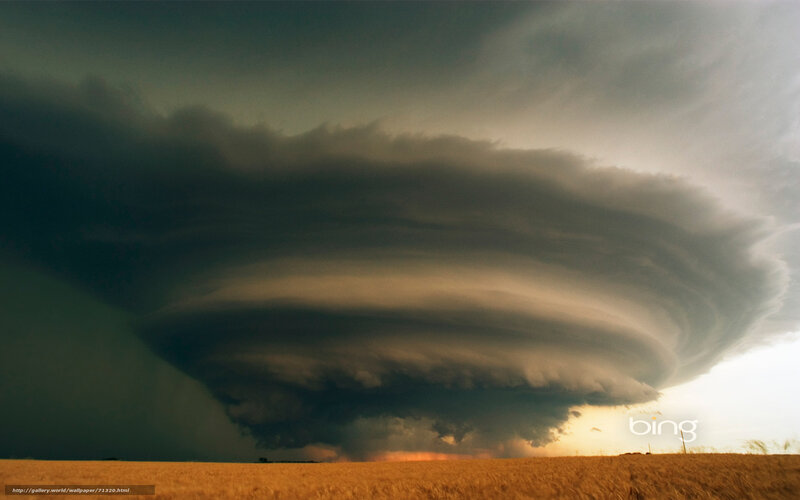 Storm cloud over field