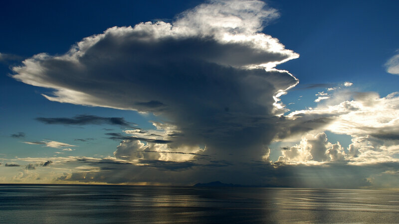 Storm Cloud over Ocean — Blue, Dramatic, Sunset