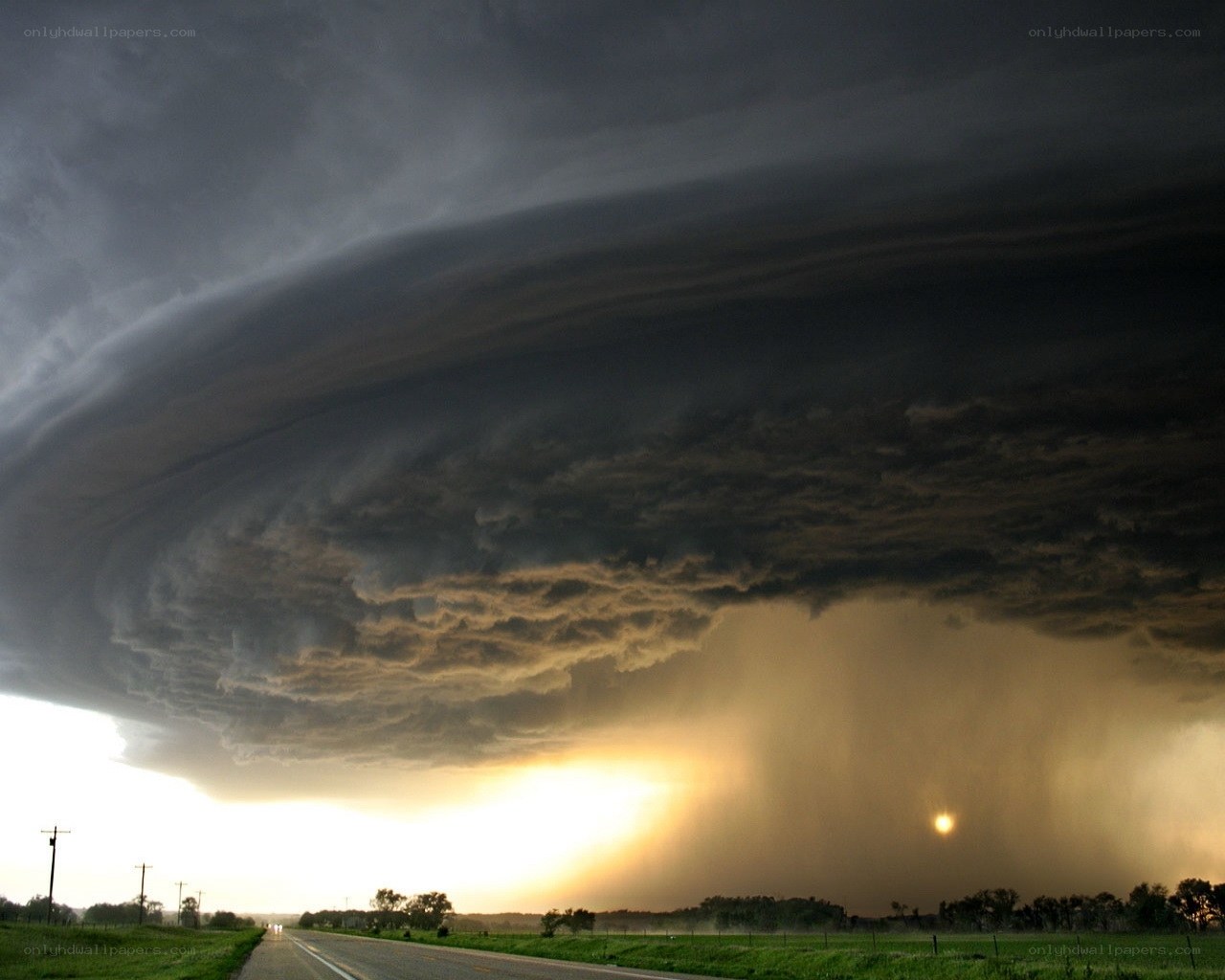 Storm cloud over rural road