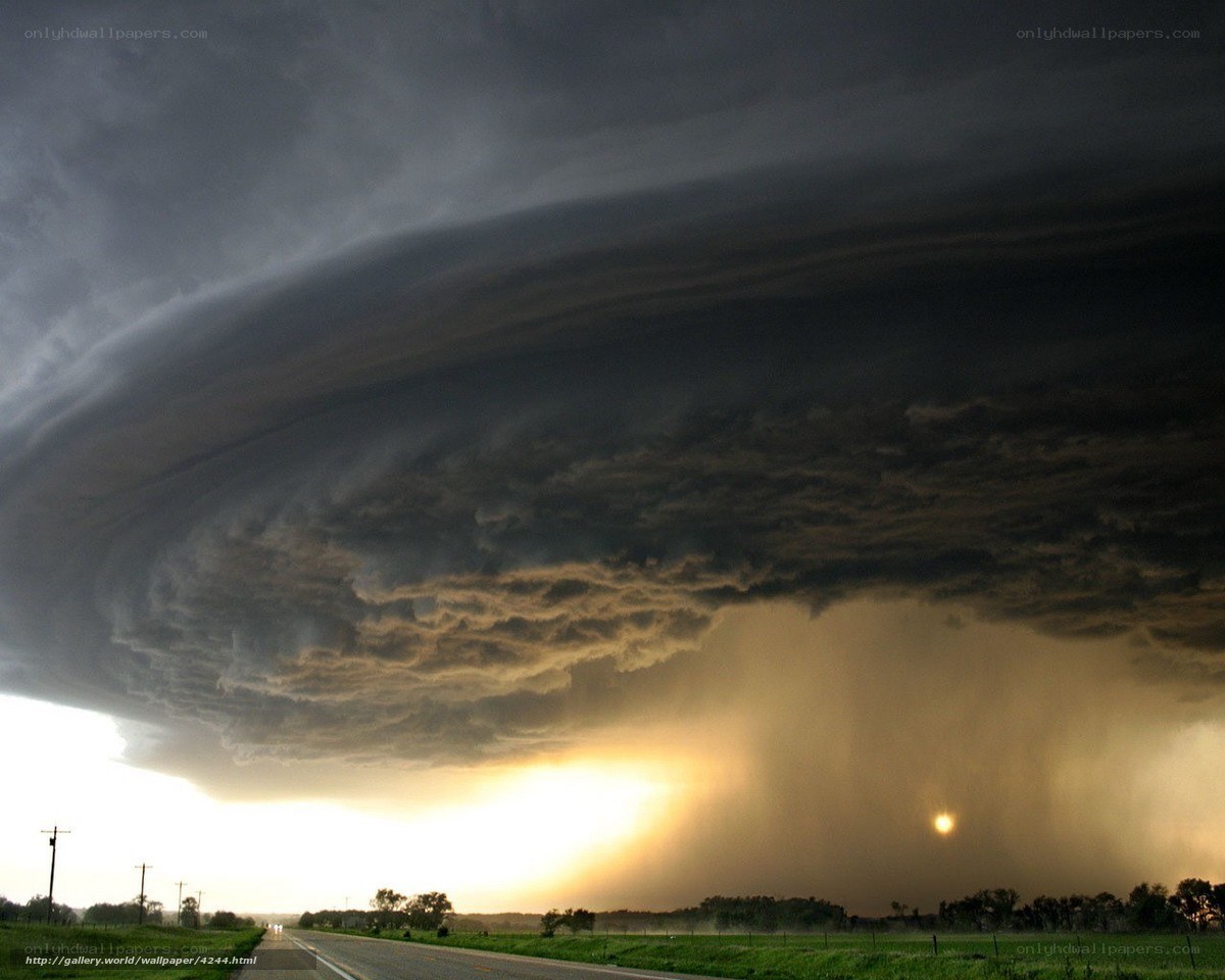 Storm cloud over rural road