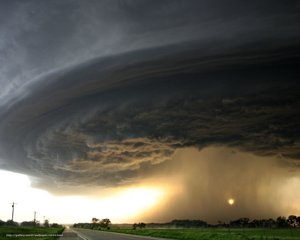 Storm cloud over rural road