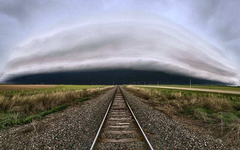 Storm Cloud over Train Tracks