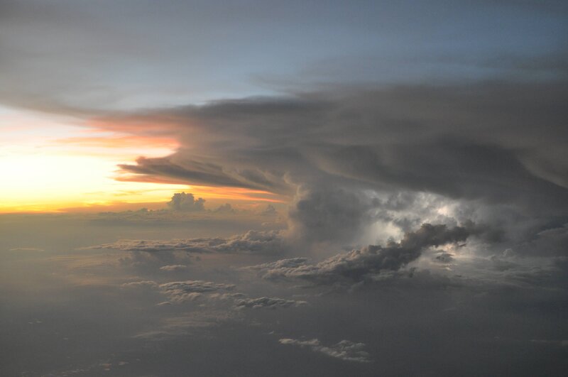 Storm clouds at sunset from above