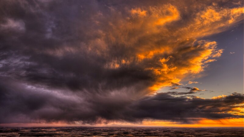 Storm Clouds at Sunset — Orange