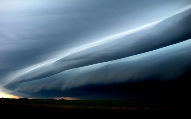 Storm clouds over a field