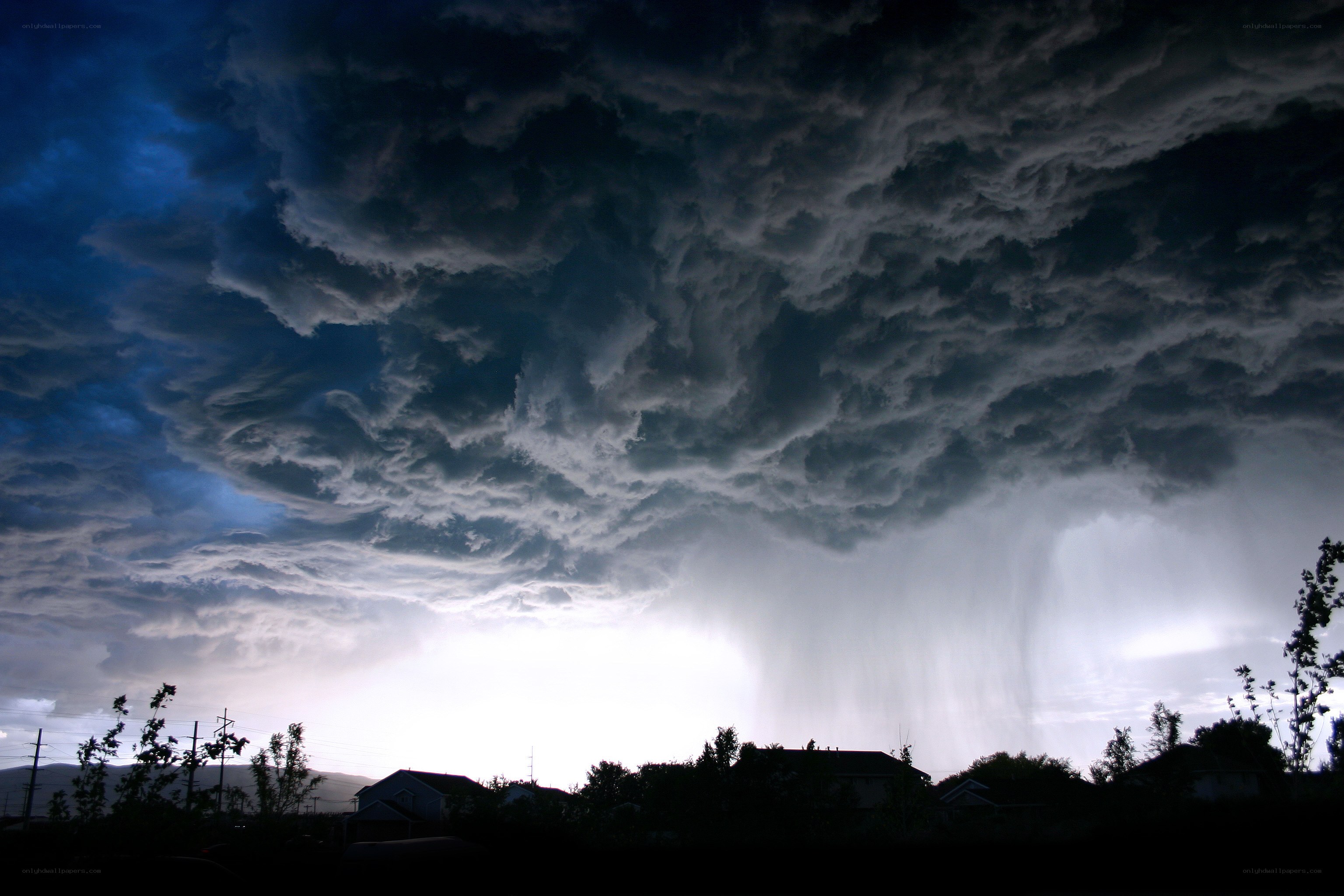 Storm clouds over a neighborhood