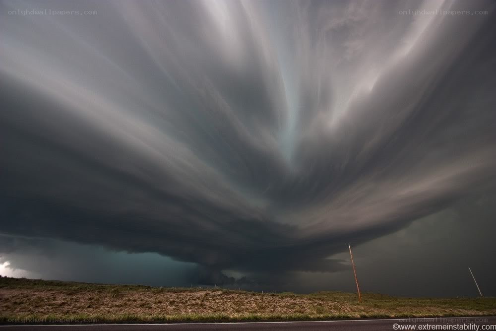 Storm clouds over a road