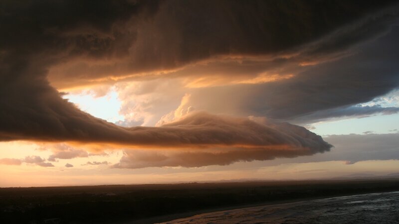 Storm Clouds over Beach — Orange, Dramatic, Sunset, Photograph, Ocean, Sky, Gray, Black