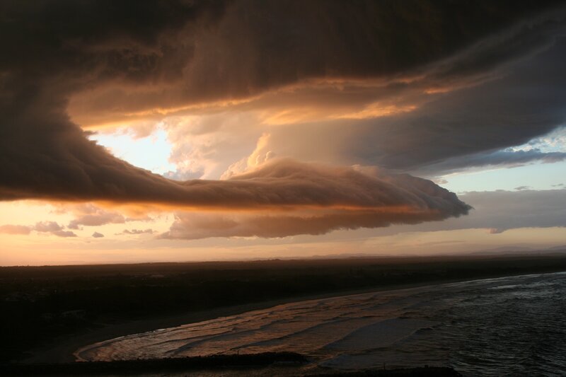 Storm Clouds over Beach — Orange, Dramatic, Sunset, Photograph, Ocean