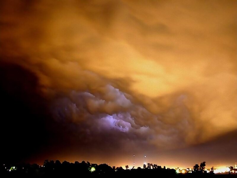 Storm Clouds over City — Orange