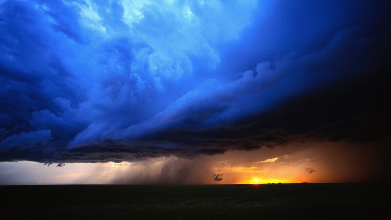 Storm Clouds over Field — Blue, Dramatic, Sunset, Photograph, Sun