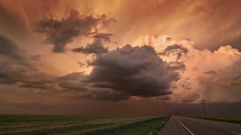 Storm Clouds over Highway — Orange, Dramatic, Sunset, Photograph