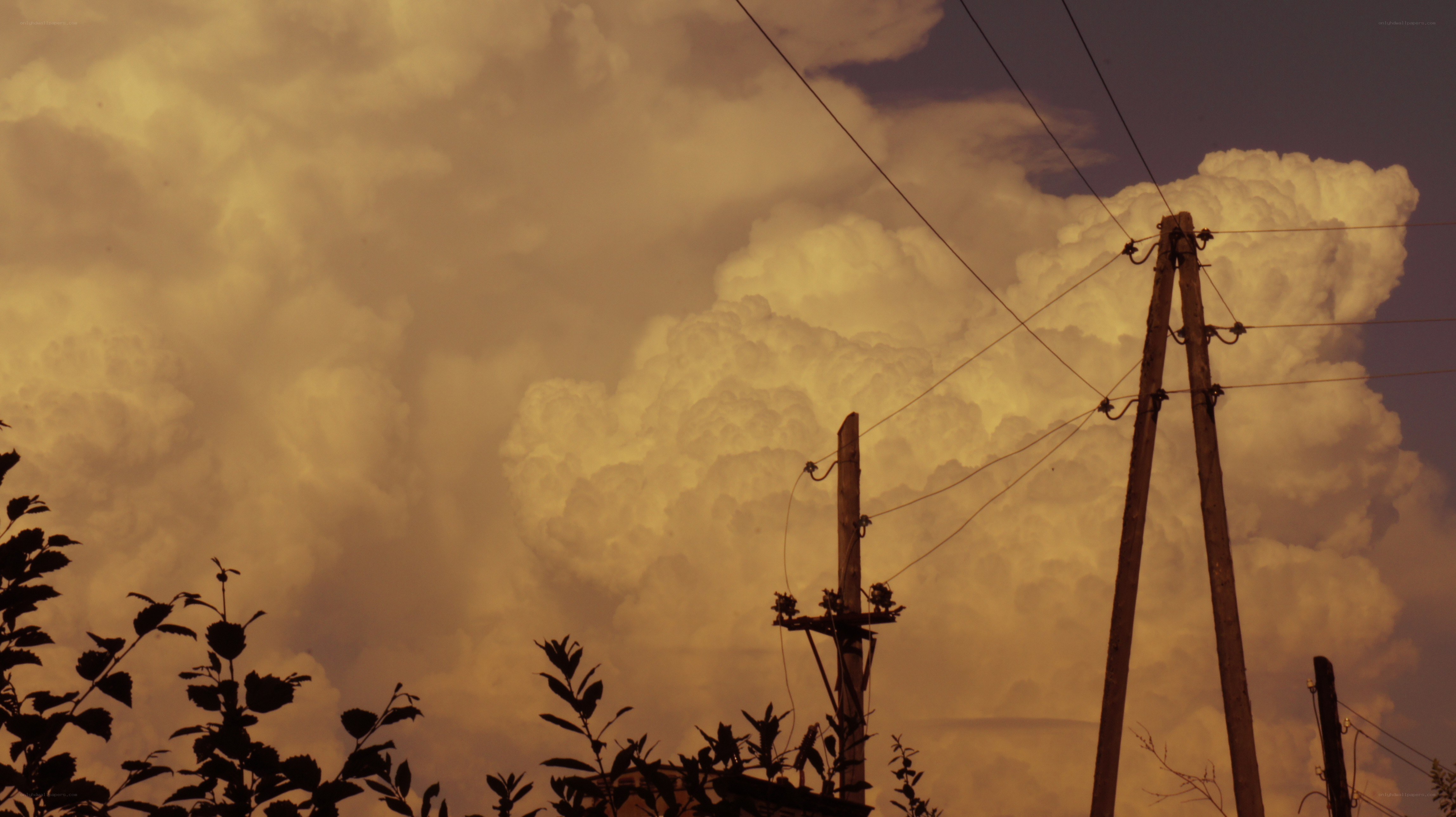 Storm clouds over power lines