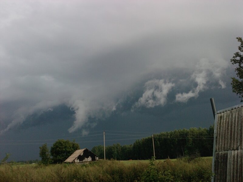 Storm clouds over rural landscape