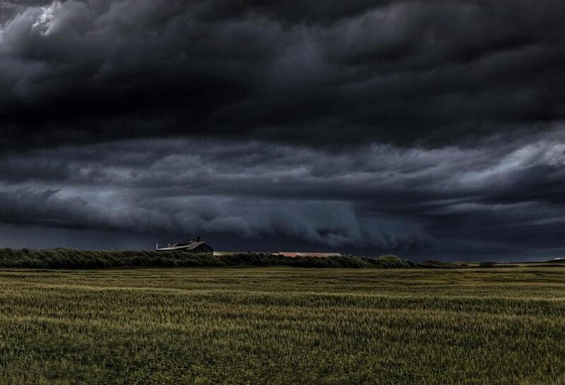 Storm over a rural field
