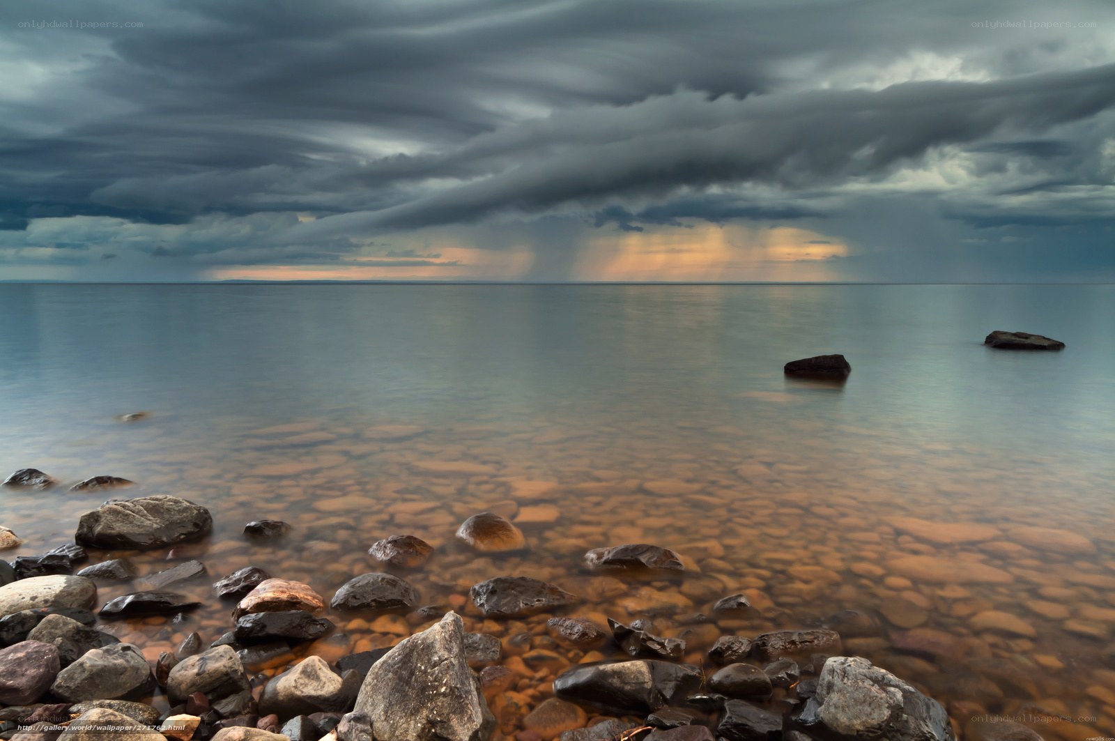 Storm over calm sea