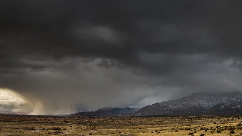 Storm over desert mountains