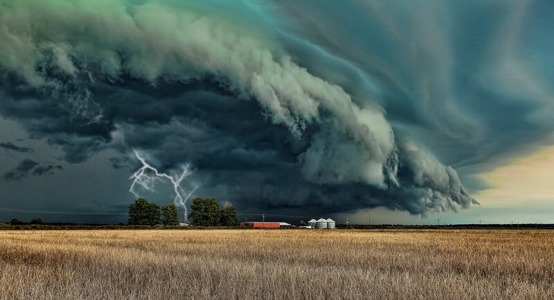 Storm over farm field