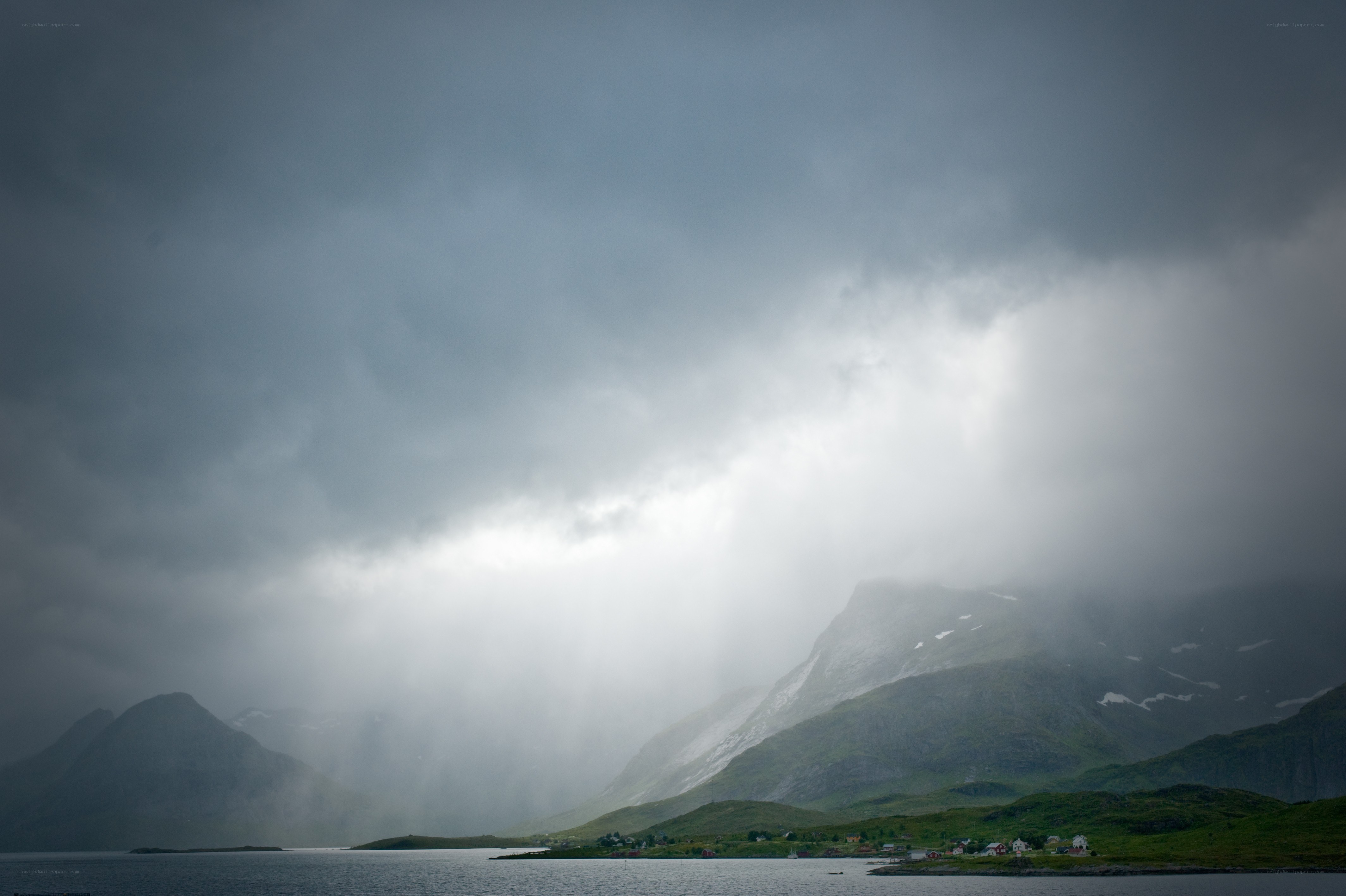 Storm over fjord landscape