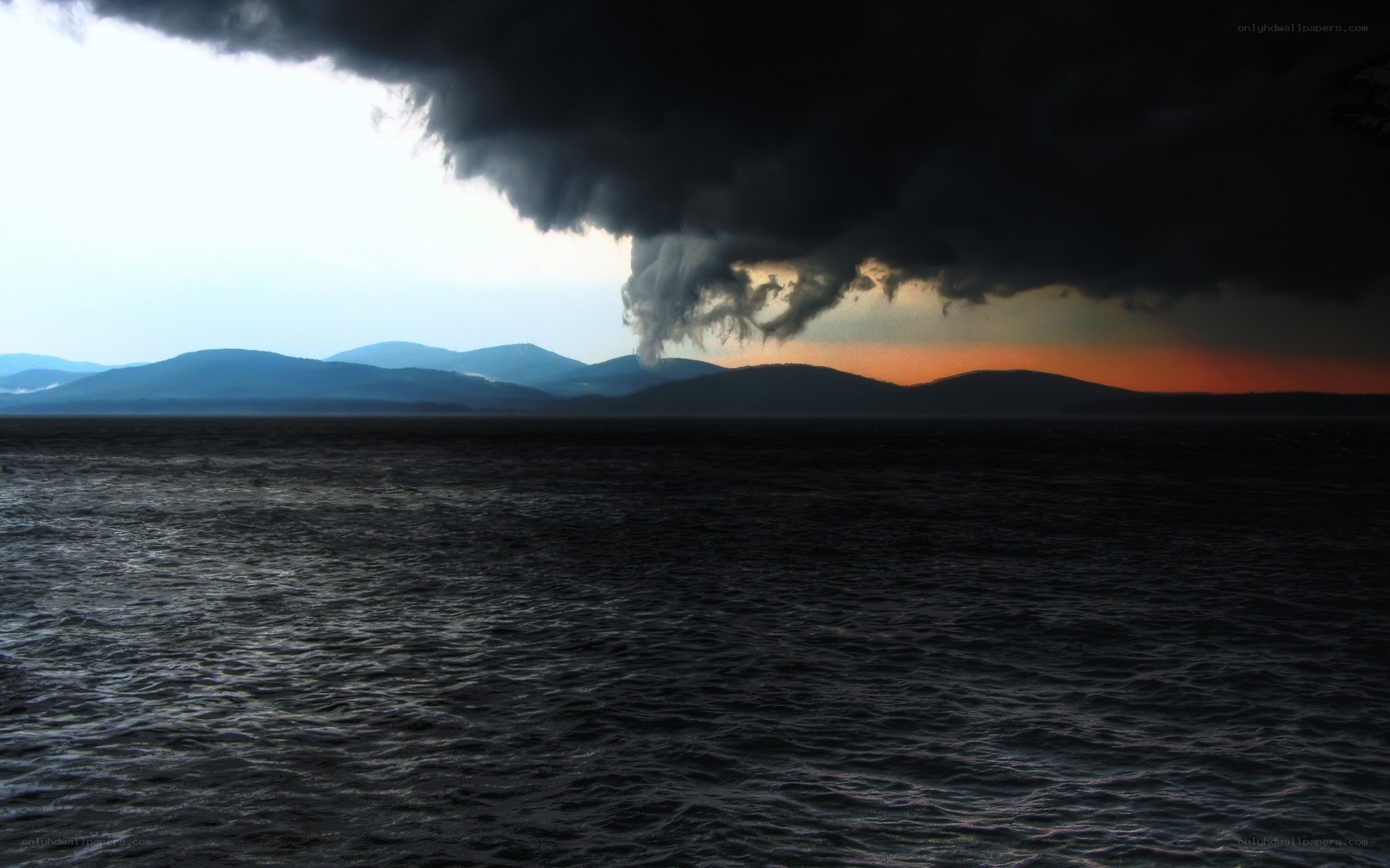 storm over lake at sunset