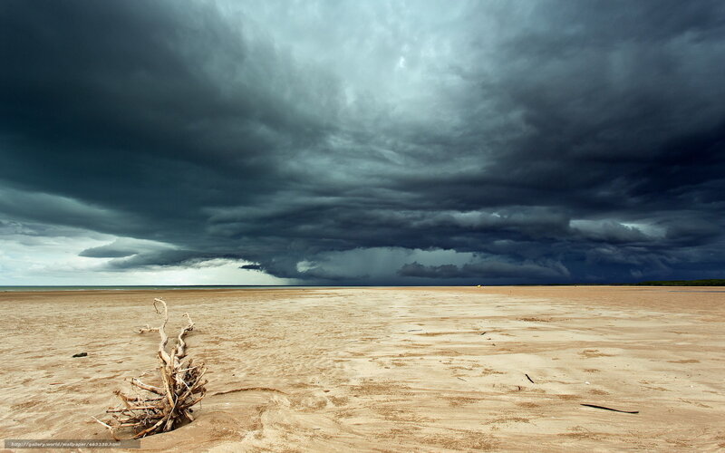 Storm over sandy beach