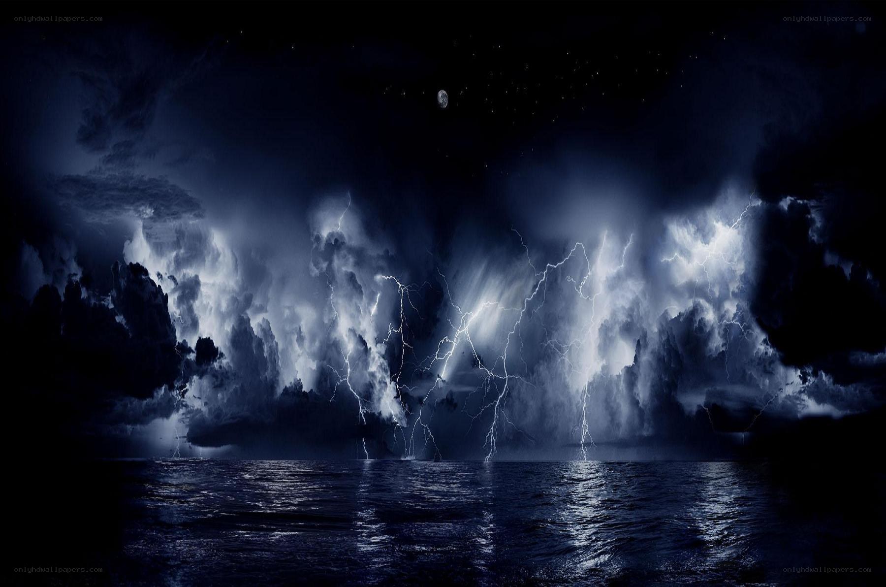 Storm over the ocean at night