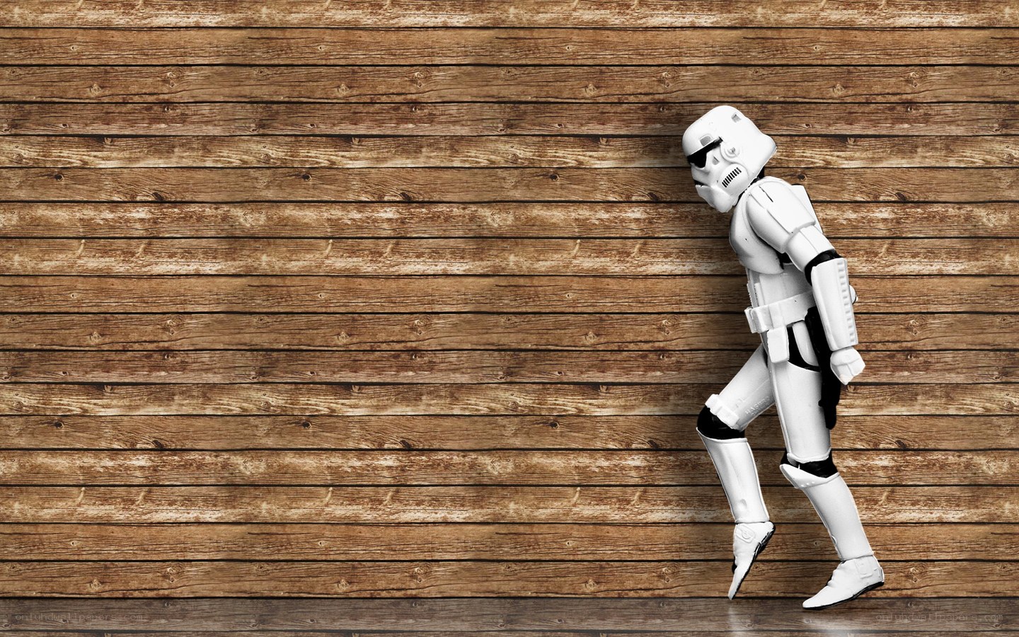 stormtrooper against wooden wall