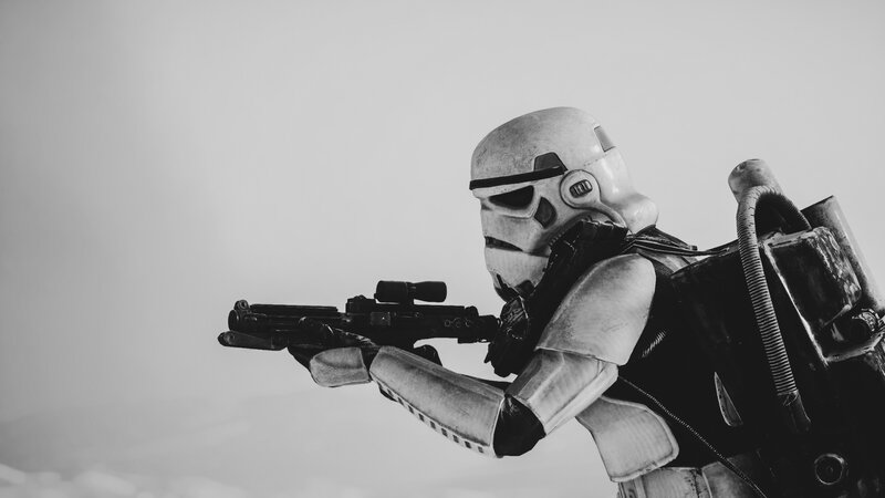 Stormtrooper Holding Blaster — Black, Dramatic, Photograph