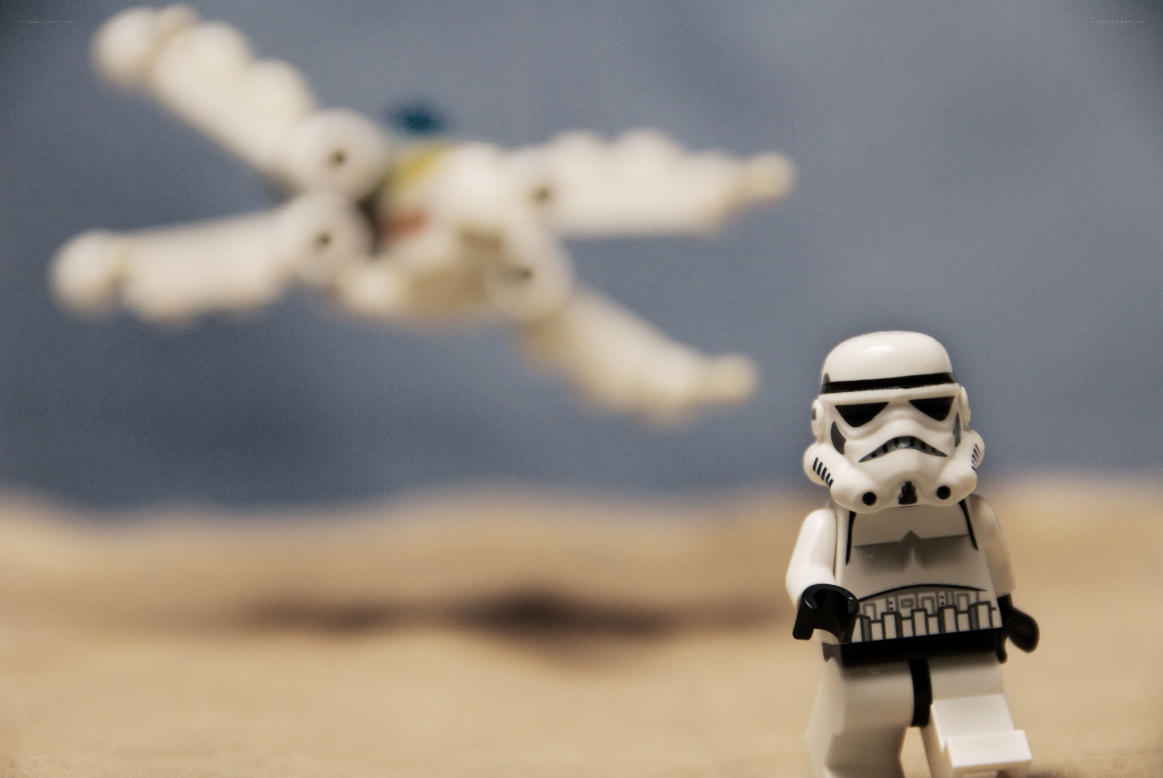 Stormtrooper with X-wing in desert