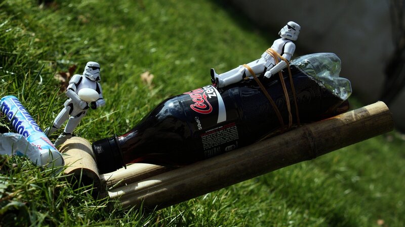 Stormtroopers on a soda bottle sled