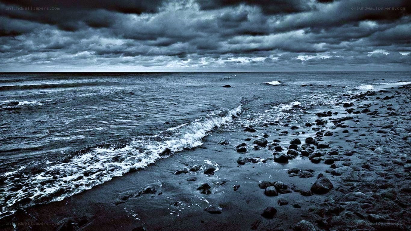 Stormy beach at dusk