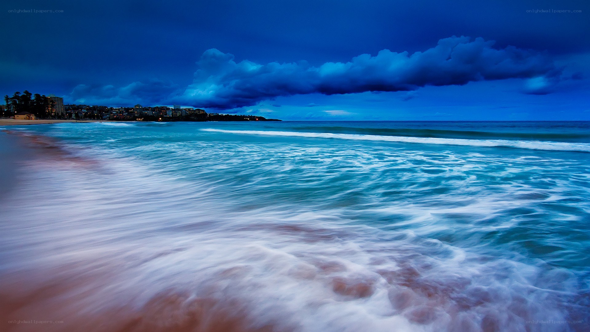Stormy beach at dusk