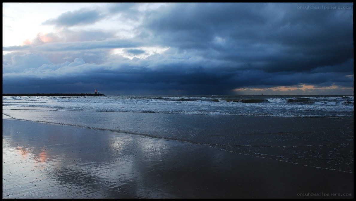 Stormy beach at dusk