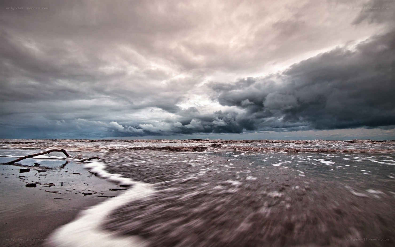 Stormy beach at dusk