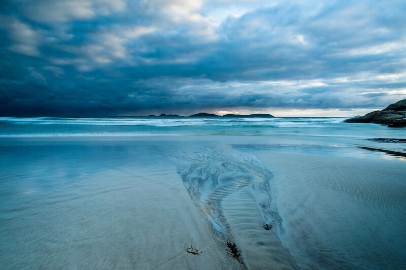 Stormy beach at dusk