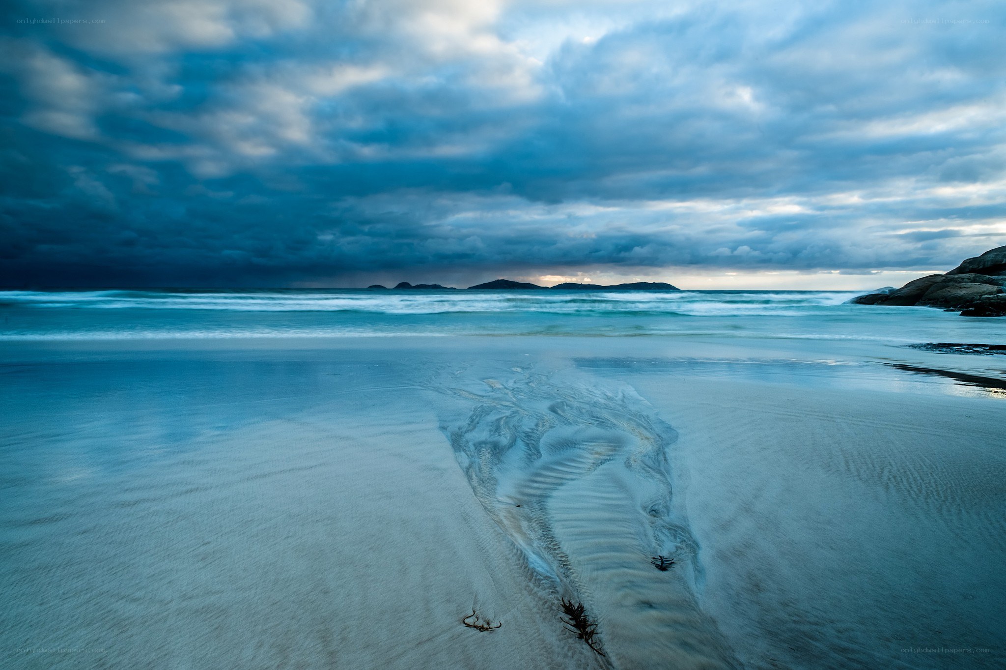Stormy beach at dusk