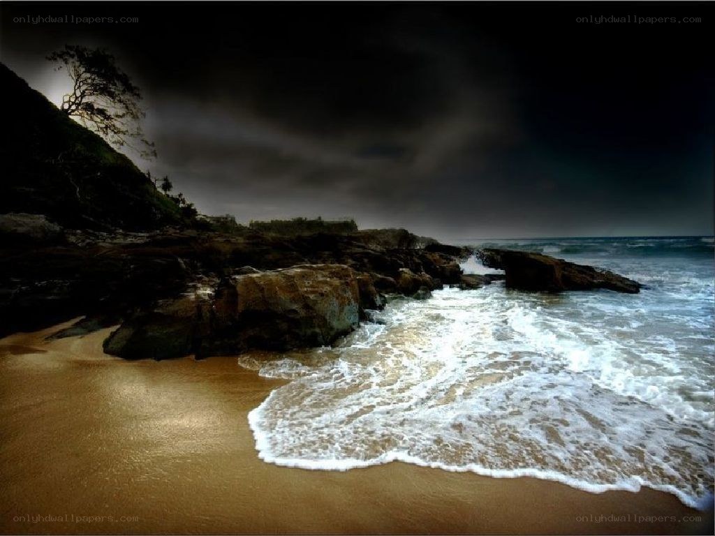 Stormy beach at dusk
