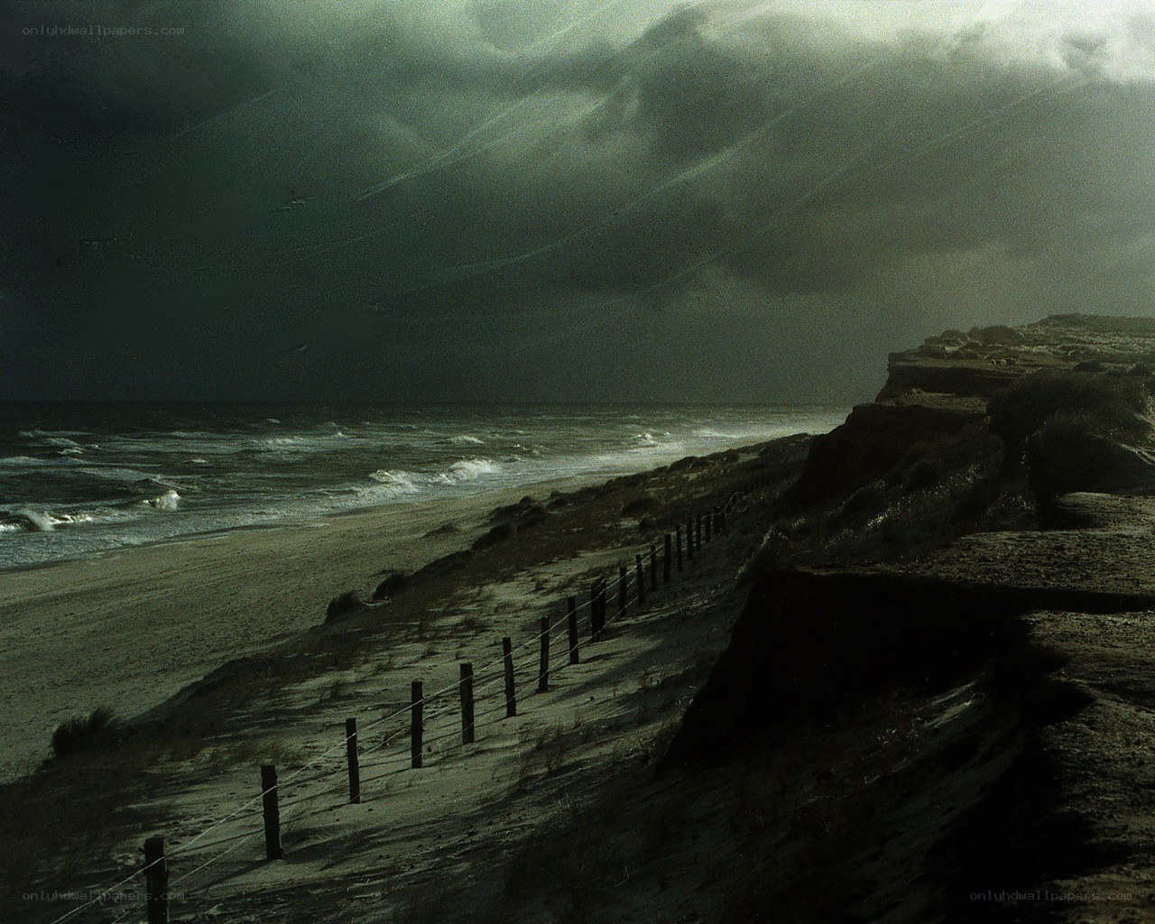 Stormy beach at dusk