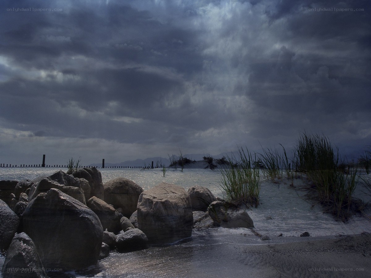 Stormy beach at dusk