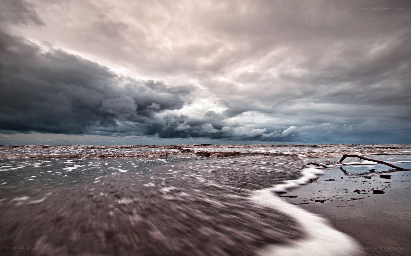 Stormy beach at dusk