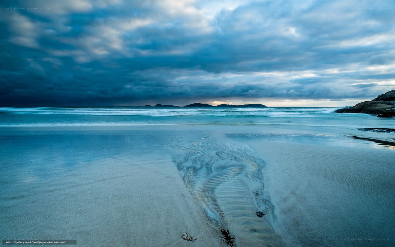 Stormy beach at dusk