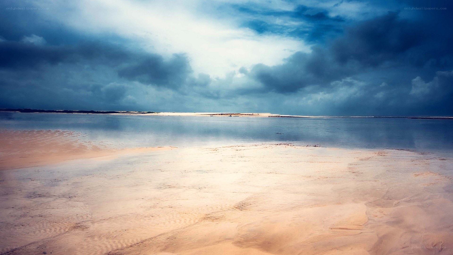 Stormy beach at low tide