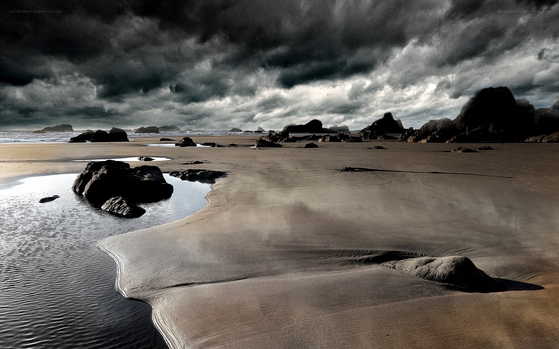 Stormy beach at low tide